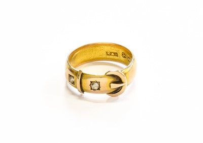 Lot 110 - A 15 Carat Gold Diamond Buckle Ring, finger...
