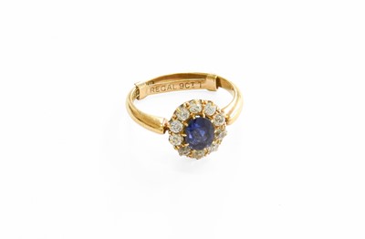 Lot 139 - An 18 Carat Gold Sapphire and Diamond Cluster...