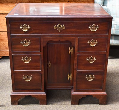 Lot 1307 - A Crossbanded Mahogany Desk of Small...