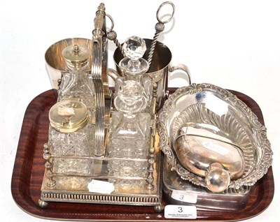 Lot 3 - A plated four bottle cruet, two plated mugs, a hip flask, a sandwich box, grape scissors and dish