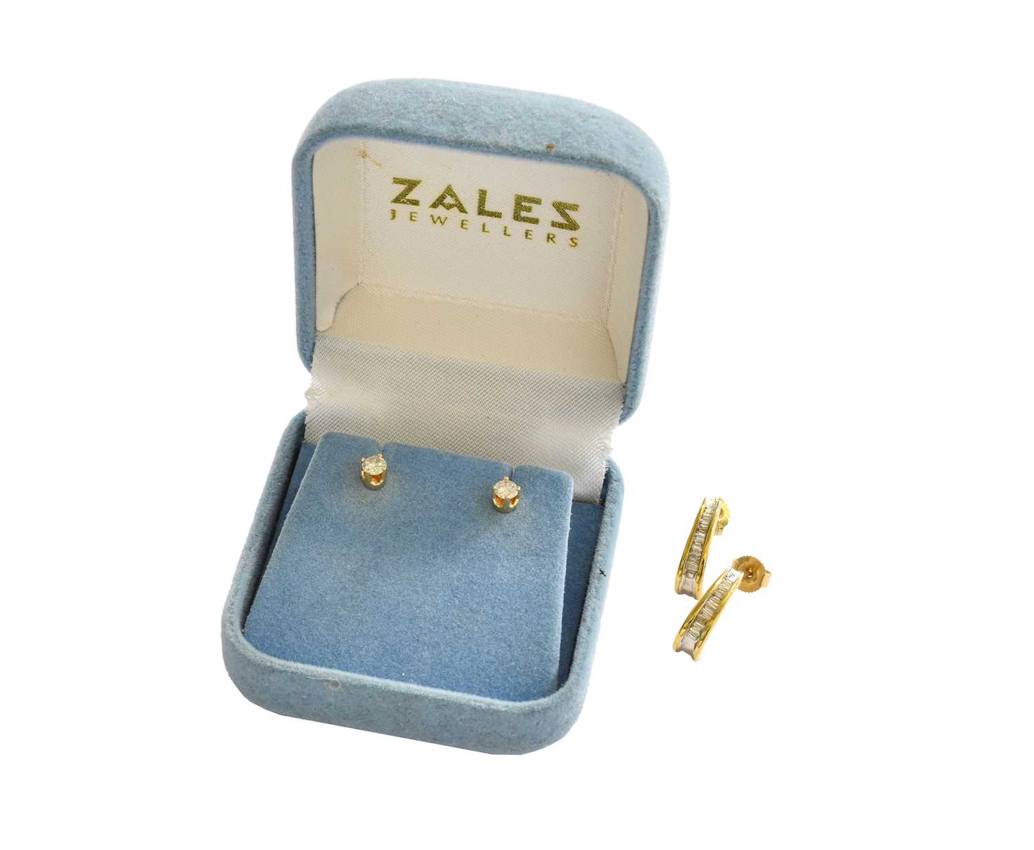Lot 34 - A Pair of Diamond Solitaire Earrings, the...