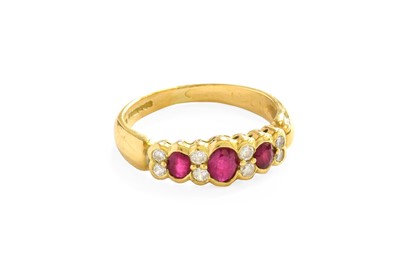 Lot 40 - An 18 Carat Gold Synthetic Ruby and Diamond...