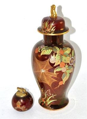 Lot 13 - A Carltonware Rouge Royal Spider Webb vase and cover and a Carltonware Rouge Royal table lighter