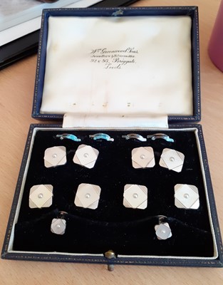 Lot 2095 - A Mother-of-Pearl and Split Pearl Button,...