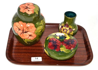 Lot 14 - A Moorcroft ginger jar, a small vase and a powder bowl and cover