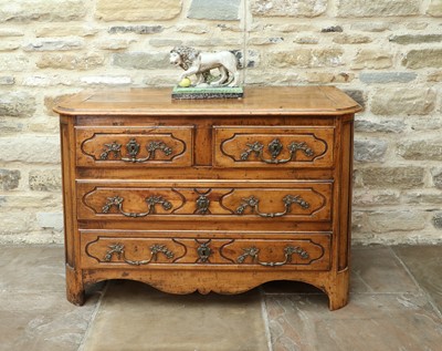 Lot 372 - An 18th Century French Walnut Commode, the top...