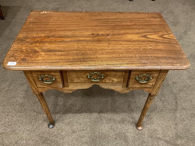 Lot 1351 - A George III Elm Dressing Table, 3rd quarter...