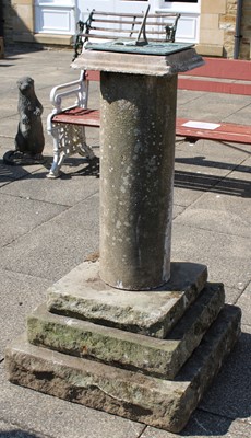 Lot 1238 - A Weathered Sandstone Sundial, the square top...