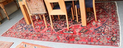 Lot 1016 - Bakhtiari Carpet, the abrashed blood red field...