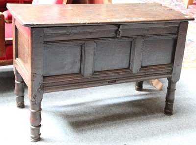 Lot 1170 - An 18th Century Panelled Oak Coffer, raised on...