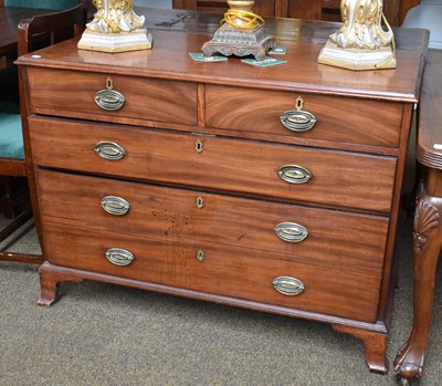 Lot 1312 - A Georgian Mahogany Four Height and Straight...