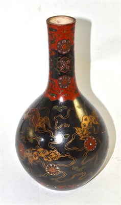 Lot 32 - A Chinese earthenware bottle vase decorated in the cloisonne style