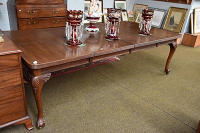 Lot 1311 - A 19th Century Mahogany Wind Out Dining Table,...