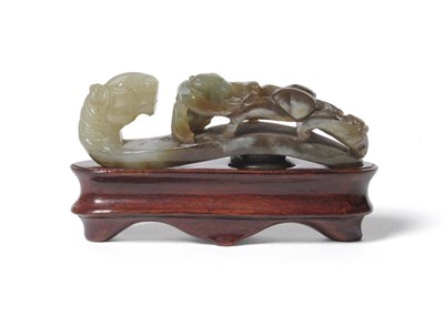 Lot 223 - A Chinese Jade Belt Hook, Qing Dynasty, carved with a monkey amongst fungus and with a horse...
