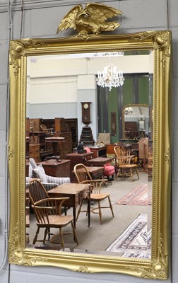 Lot 1148 - A Gilt Framed Wall Mirror, modern, in the...