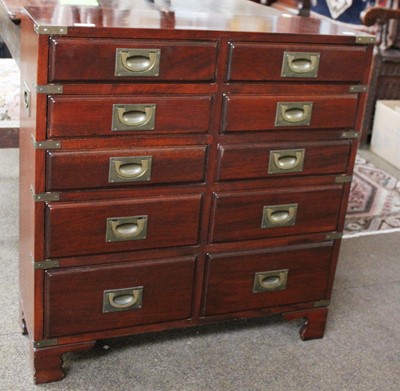 Lot 1375 - A 20th Century Ten Drawer Chest, with campaign...