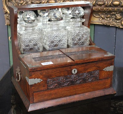 Lot 427 - A Metal Mounted Oak Three Bottle Tantalus