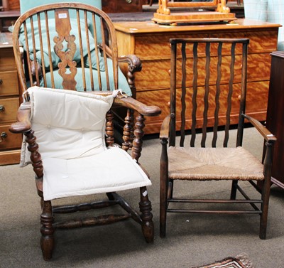 Lot 1306 - A 19th century Ash and Elm Windsor Armchair;...