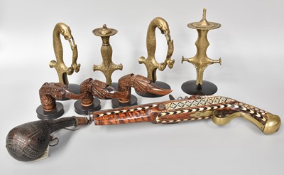 Lot 340 - Four Gilt Metal Tulwar Handles, together with...