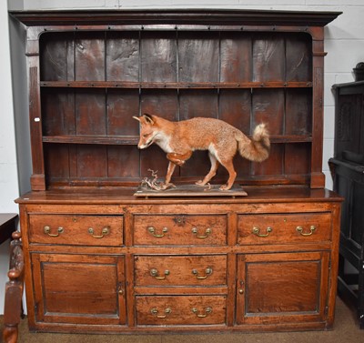 Lot 1366 - An 18th century Carved Oak Dresser and Rack,...