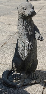 Lot 1243 - A Composition Garden Statue of Standing Otter,...