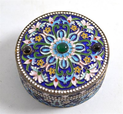 Lot 55 - A Russian circular box with enamel decoration, bears Russian silver marks