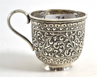 Lot 71 - A Russian Charka, of typical form, with scrolling repousse decoration, bears Russian silver marks