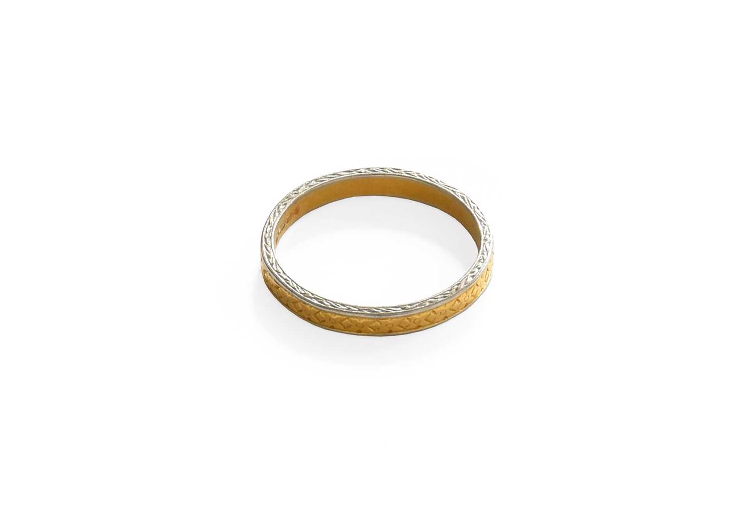 Lot 133 - A 22 Carat Gold Band Ring, with white edging,...
