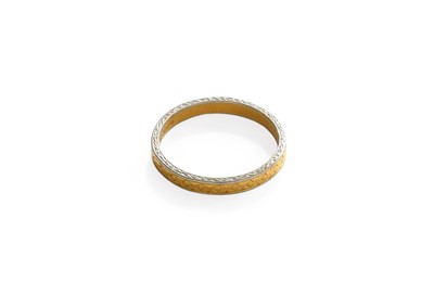 Lot 133 - A 22 Carat Gold Band Ring, with white edging,...