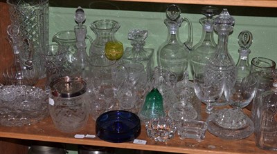 Lot 83 - A shelf of decorative cut glass including vases, decanters, bowls, dressing table items, a...
