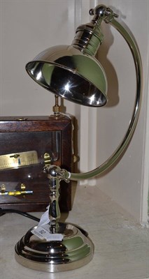 Lot 92 - Nickel plated desk lamp on circular base, wired for electricity