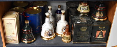 Lot 246 - Eighteen Bells Decanters, and a Famous Grouse...