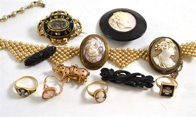 Lot 100 - A jet and cameo brooch, a jet bar brooch, two cameo brooches, a synthetic pearl choker, a...