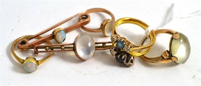 Lot 104 - A moonstone set ring and bar brooch, a similar ring, an opal set ring and bar brooch and two...