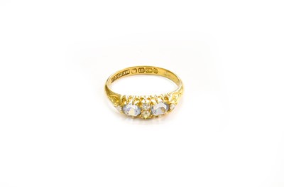 Lot 119 - An 18 Carat Gold Blue Spinel and Diamond Ring,...
