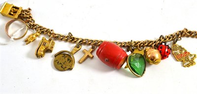 Lot 106 - A 9ct gold charm bracelet