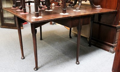 Lot 1236 - A Georgian Oak Pad Foot Dining Table, 139cm by...