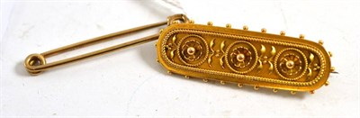 Lot 118 - An Edwardian gold and filigree bar brooch and a stock pin