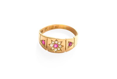 Lot 136 - An 18 Carat Gold Ruby and Diamond Ring, finger...