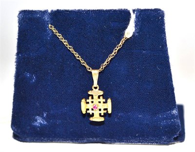 Lot 125 - A 9ct gold cross on chain, and others and paperwork