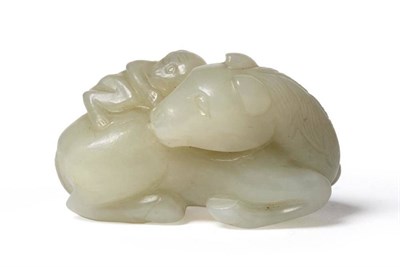 Lot 233 - A Carved Pale Green Jade Type Figure of a Horse, in Ming style, recumbent with a monkey on its...