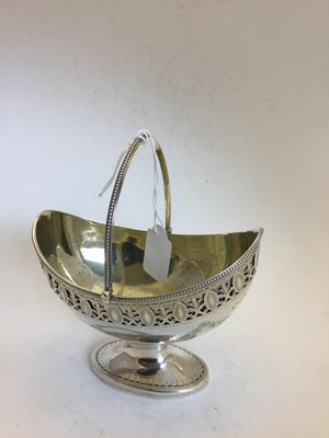 Lot 2325 - A George III Silver Sugar-Basket and A George III Silver Liner