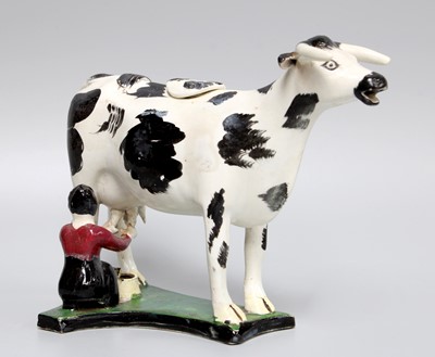 Lot 180 - An Early 19th-century Cow Creamer, probably...