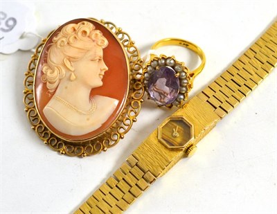 Lot 140 - An amethyst and cultured pearl ring, a 9ct gold cameo brooch and a lady's wristwatch with a tiger's