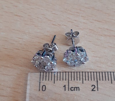 Lot 2013 - A Pair of 18 Carat White Gold Diamond Cluster...