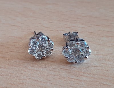 Lot 2013 - A Pair of 18 Carat White Gold Diamond Cluster...