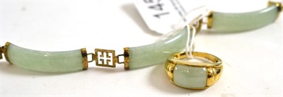 Lot 145 - A 9ct gold jade ring and a jade bracelet (mount unmarked)