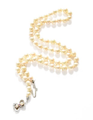 Lot 16 - A Cultured Pearl Necklace, with a ruby and...
