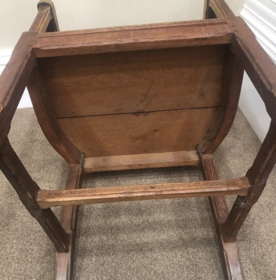 Lot 651 - An Arts & Crafts Oak Chair, curved back rail...