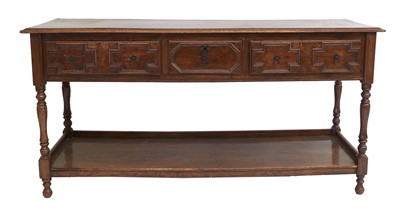 Lot 278 - An Oak Geometric-Moulded Dresser Base, the...